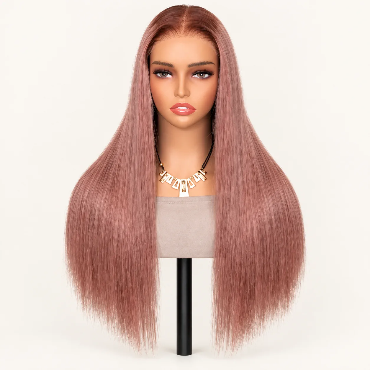 Long straight rose-pink wig on a mannequin head